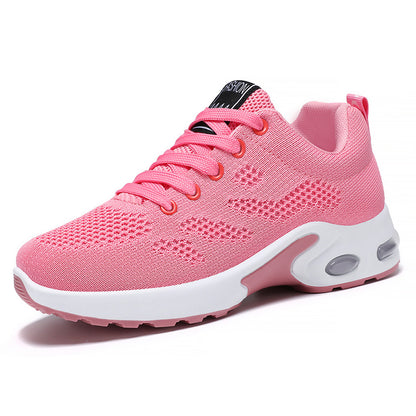 Pink sneaker with white sole on a white background