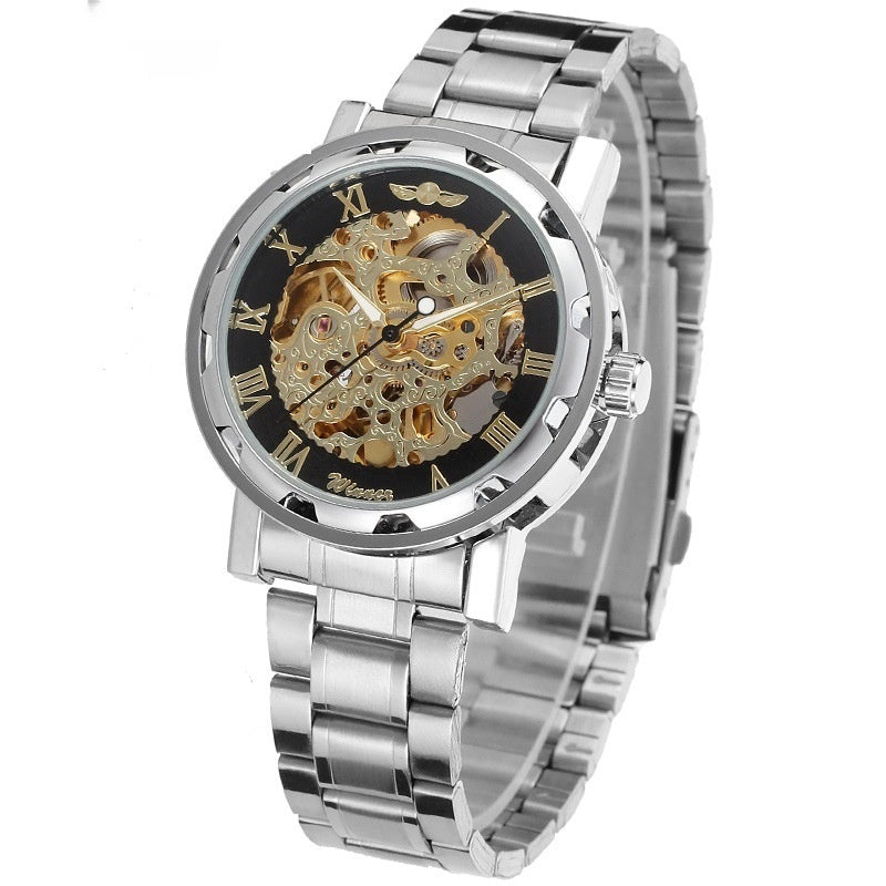 Silver watch with a black face and gold mechanical components on a white background