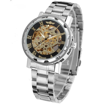 Silver watch with a black face and gold mechanical components on a white background