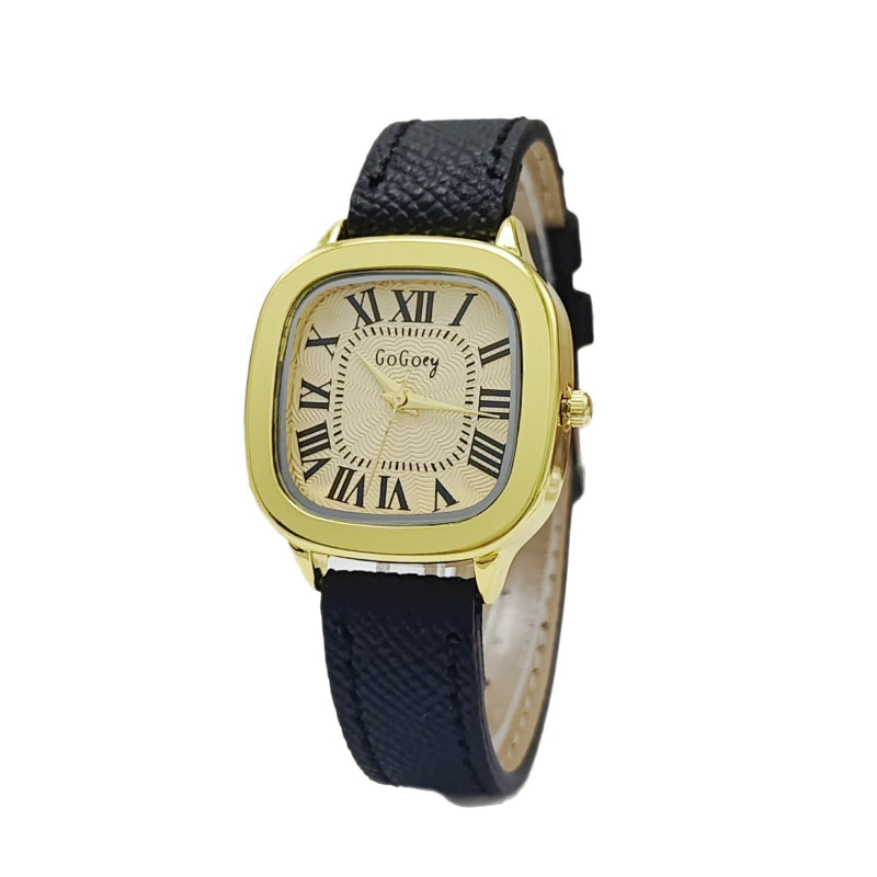 Gold watch with black strap on a white background