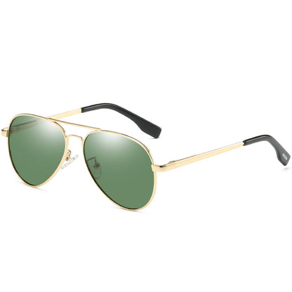 Gold-framed sunglasses with green lenses on a white background