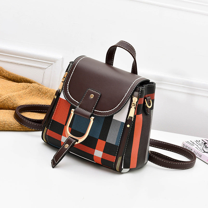 Brown plaid crossbody bag with front buckle flap and side zipper