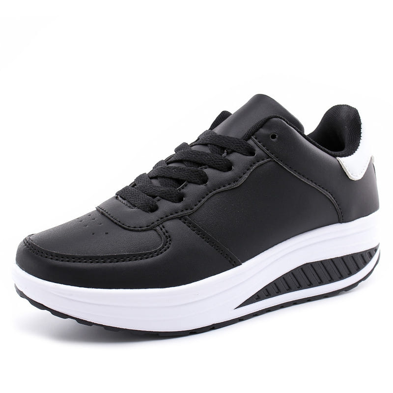 Women's black woven sport shoes, lace-up with white heel accent and white cushioned sole