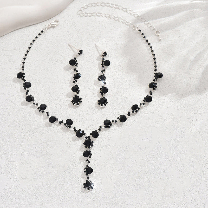 Black crystal necklace with drop earrings and coordinating bracelet