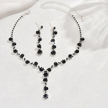 Black crystal necklace with drop earrings and coordinating bracelet