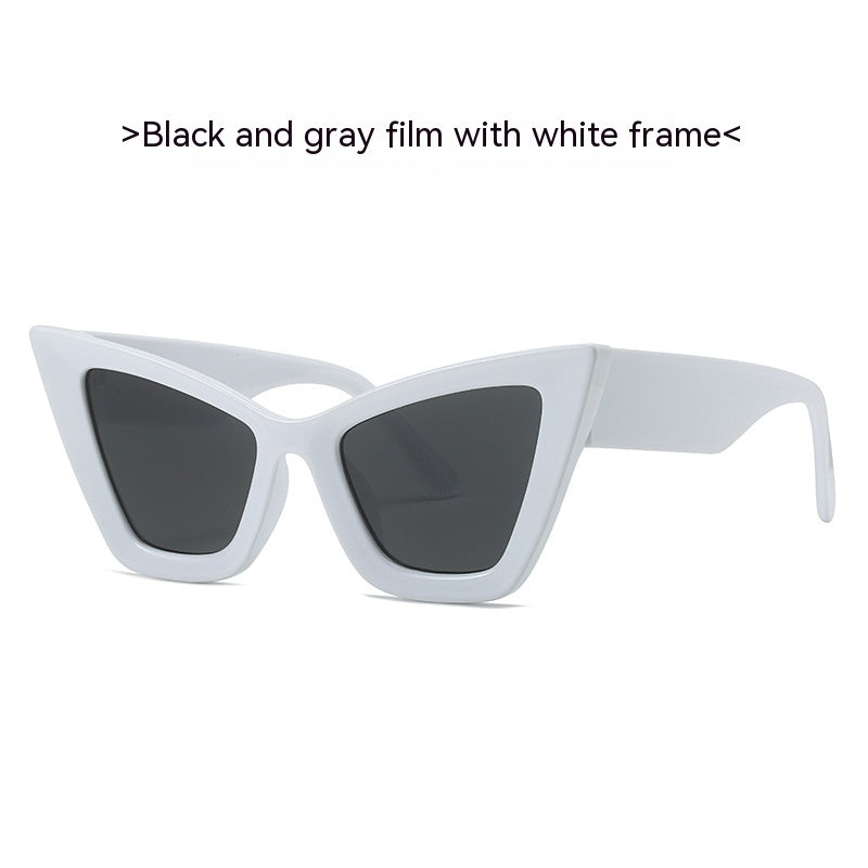 Sunglasses with white frame and black and gray lenses on a white background