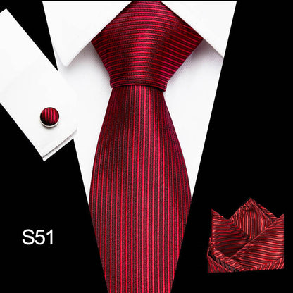 Red striped tie set with pocket square and cufflinks on a white background