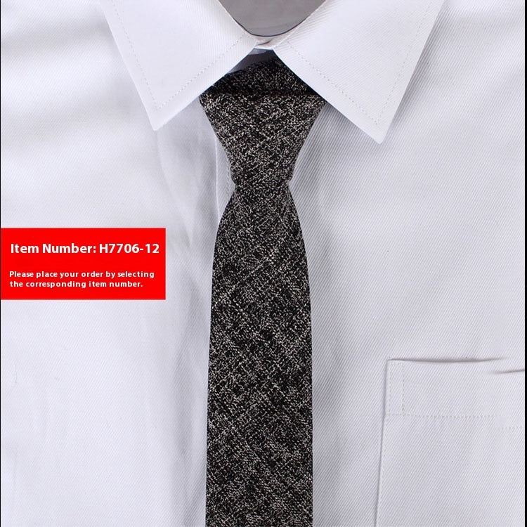 White shirt with a black patterned tie on a white background, item number H7706-12 displayed.