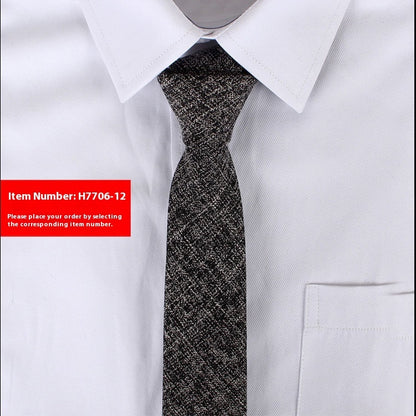 White shirt with a black patterned tie on a white background, item number H7706-12 displayed.