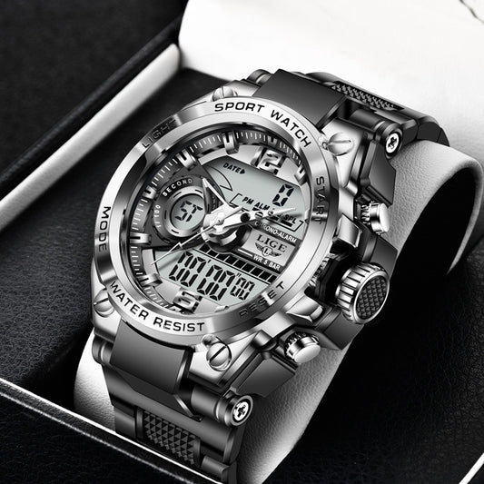 Silver digital sports watch with black strap on a dark background