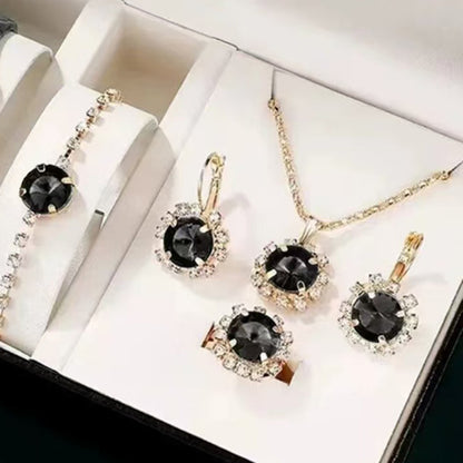 Jewelry set with black gemstones in a box