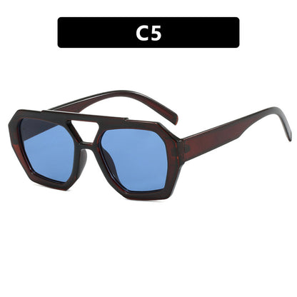 Sunglasses with blue lenses and brown frame on a white background