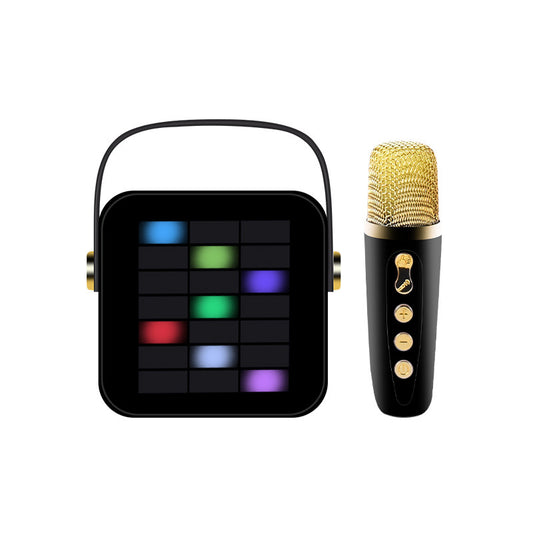 Black electronic device with colorful display and gold microphone on a white background