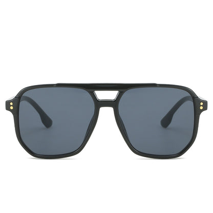 Black sunglasses with dark lenses on a white background