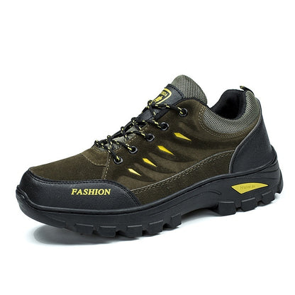 Brown hiking shoe with black sole on a white background