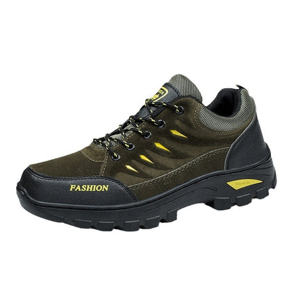 Brown hiking shoe with black sole on a white background