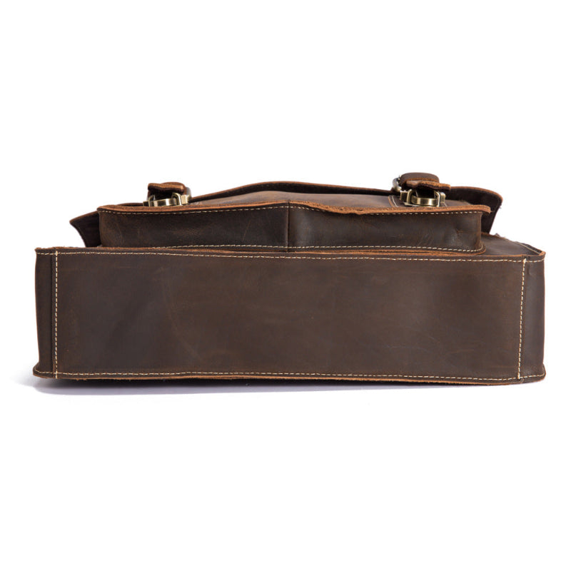 Brown leather bag on a white background