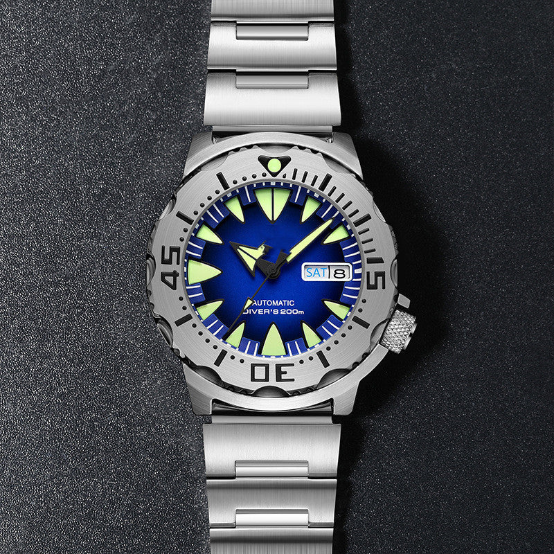 Diving wristwatch with blue and green face on a dark background