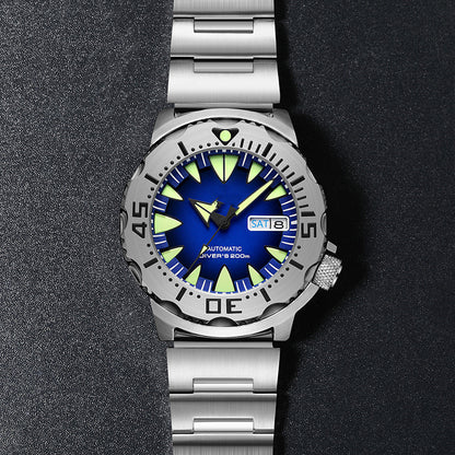 Diving wristwatch with blue and green face on a dark background