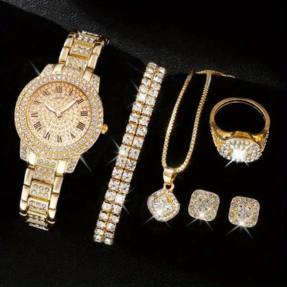 Gold jewelry set including watch, bracelet, necklace, ring, and earrings on a black background