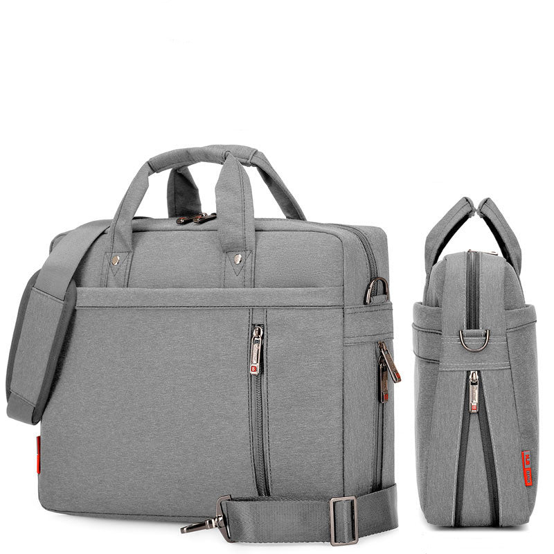 Gray backpack with multiple zippers on a white background