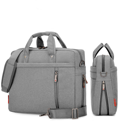 Gray backpack with multiple zippers on a white background