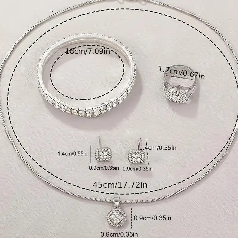 Jewelry set with necklace, ring, and earrings on a white background with measurements.