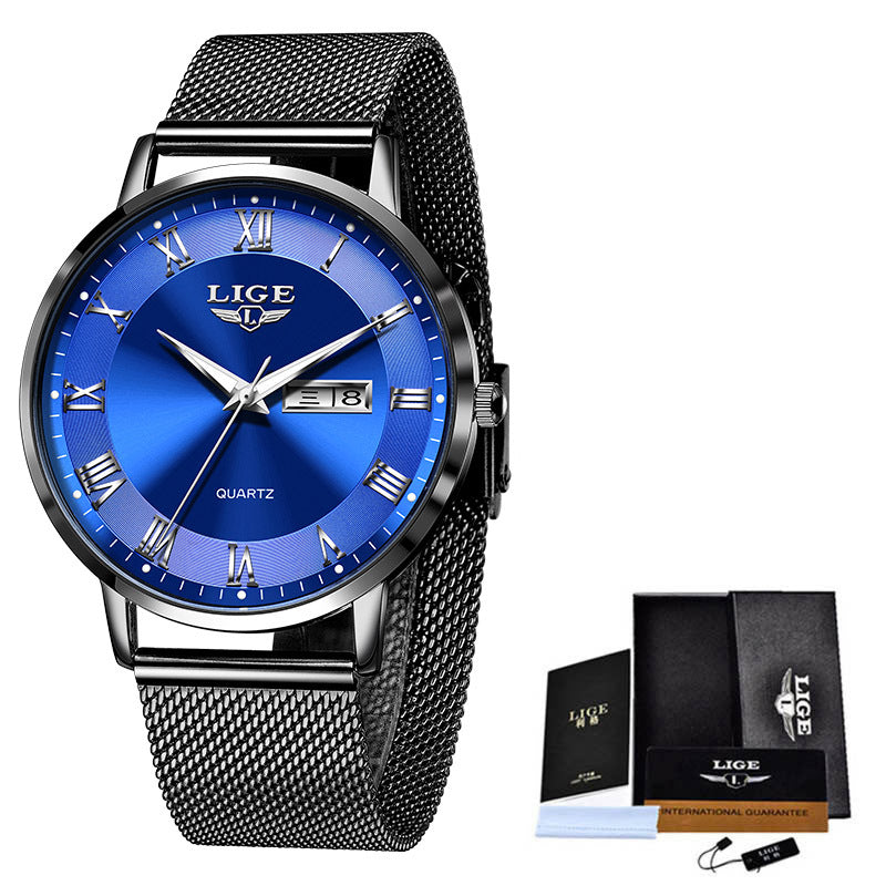 Lige watch with blue face and black mesh strap, including packaging on a white background