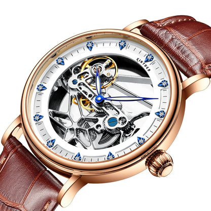 Luxury watch with brown leather strap and rose gold case on white background