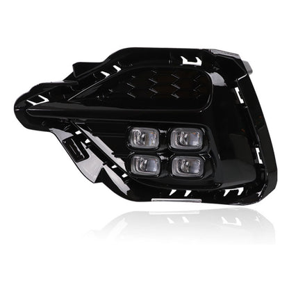 Black car headlight on a white background