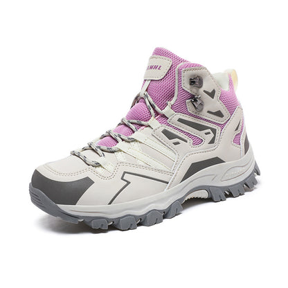 Pink and gray hiking boot on a white background