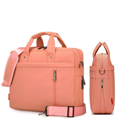 Pink backpack with multiple compartments on a white background