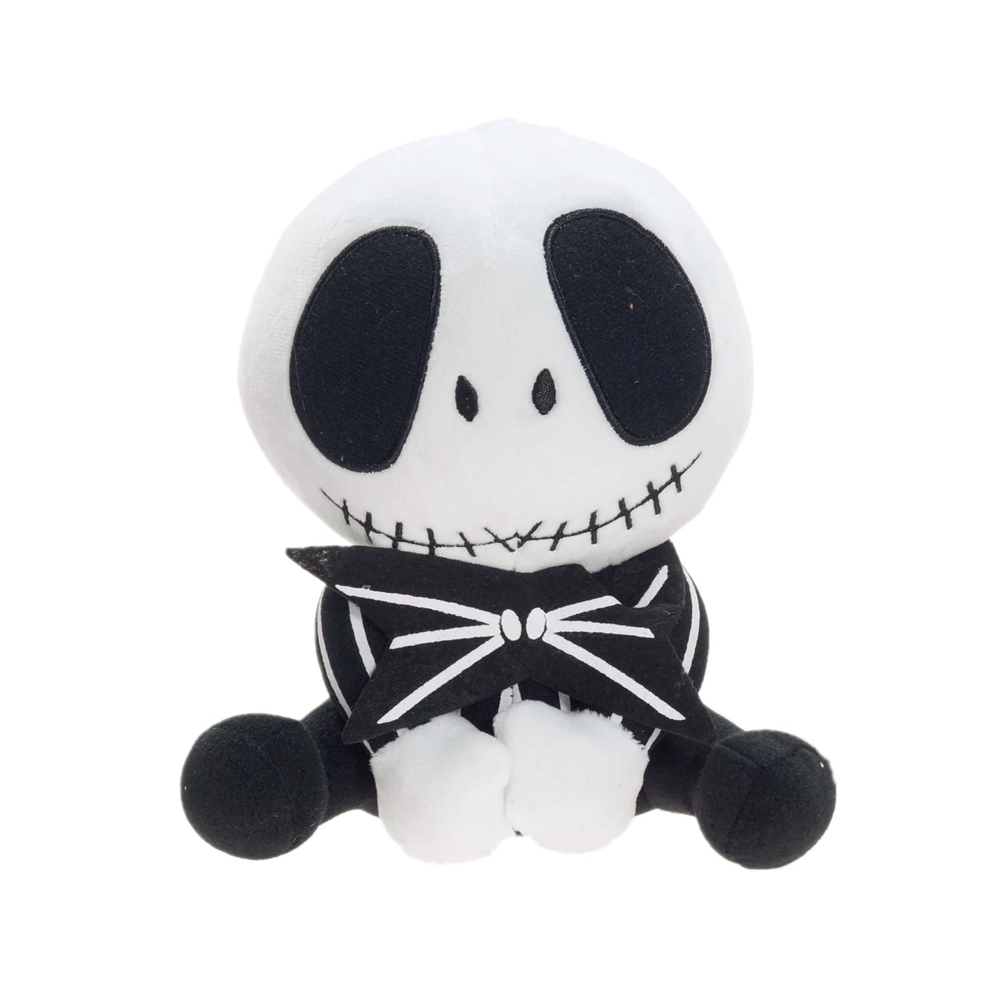 Plush toy resembling a character with a white face, black eyes, and a black bow tie on a white background