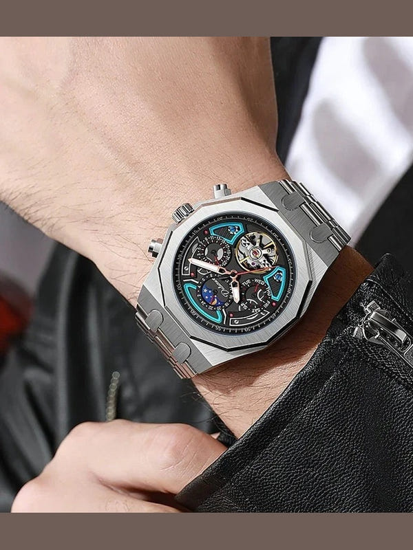 Men's automatic sports watch with silver case, black dial, turquoise accents, metal bracelet