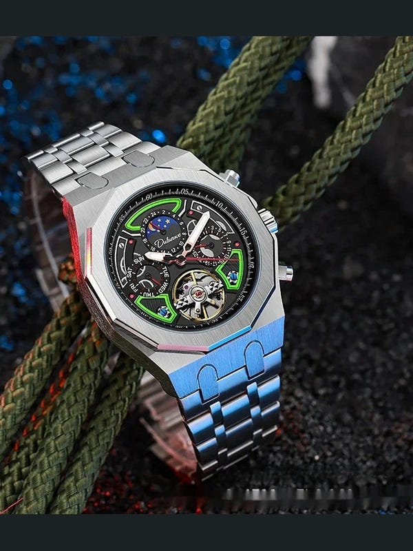 Men's automatic sports watch with silver case, black dial, multicolor subdials, blue link bracelet