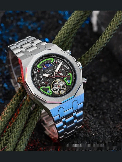 Men's automatic sports watch with silver case, black dial, multicolor subdials, blue link bracelet