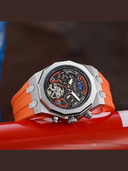 Men's automatic sports watch with silver case, black dial, multicolor subdials, orange silicone strap