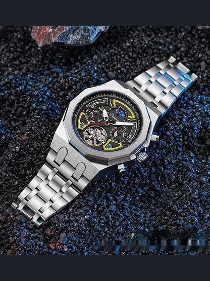 Men's automatic sports watch with silver case and metal bracelet, black dial, yellow and blue accents