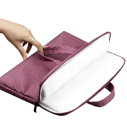 Purple laptop bag with a hand opening it on a white background