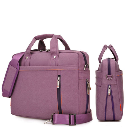 Purple travel bag with shoulder strap on a white background