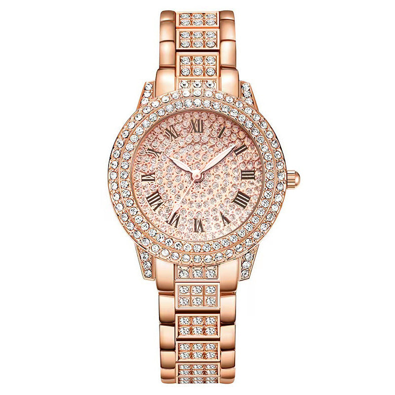 Rose gold watch with diamond accents on a white background