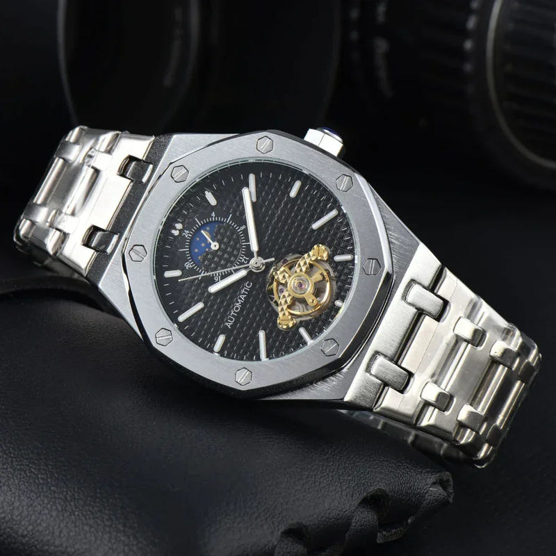 Men’s automatic mechanical watch with black dial and gold movement, silver stainless steel bracelet