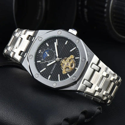 Men’s automatic mechanical watch with black dial and gold movement, silver stainless steel bracelet