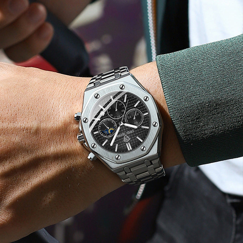 Silver watch on a wrist with a blurred background