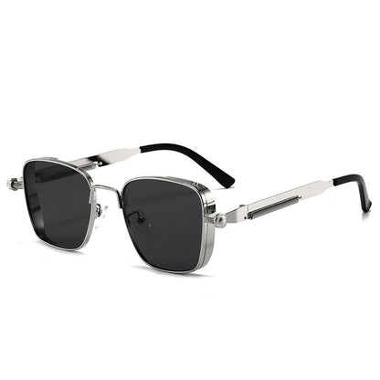 Sunglasses with black lenses and silver frames on a white background