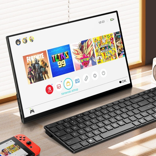 Tablet with gaming interface on a desk with keyboard and Switch controller