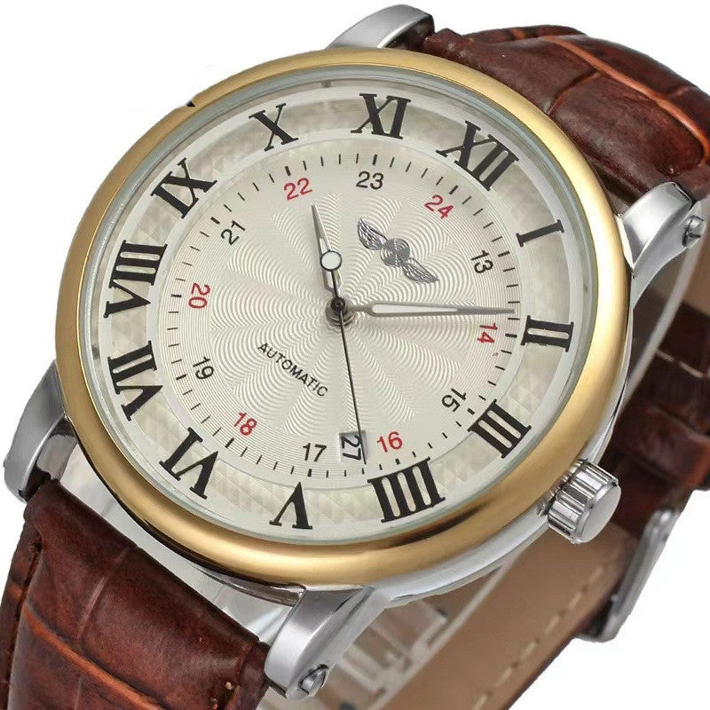Watch with brown leather strap and gold and silver case on white background