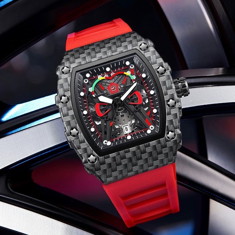 Watch with red and black strap on a blurred background