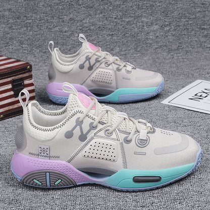 White sneakers with purple and blue accents on a gray surface