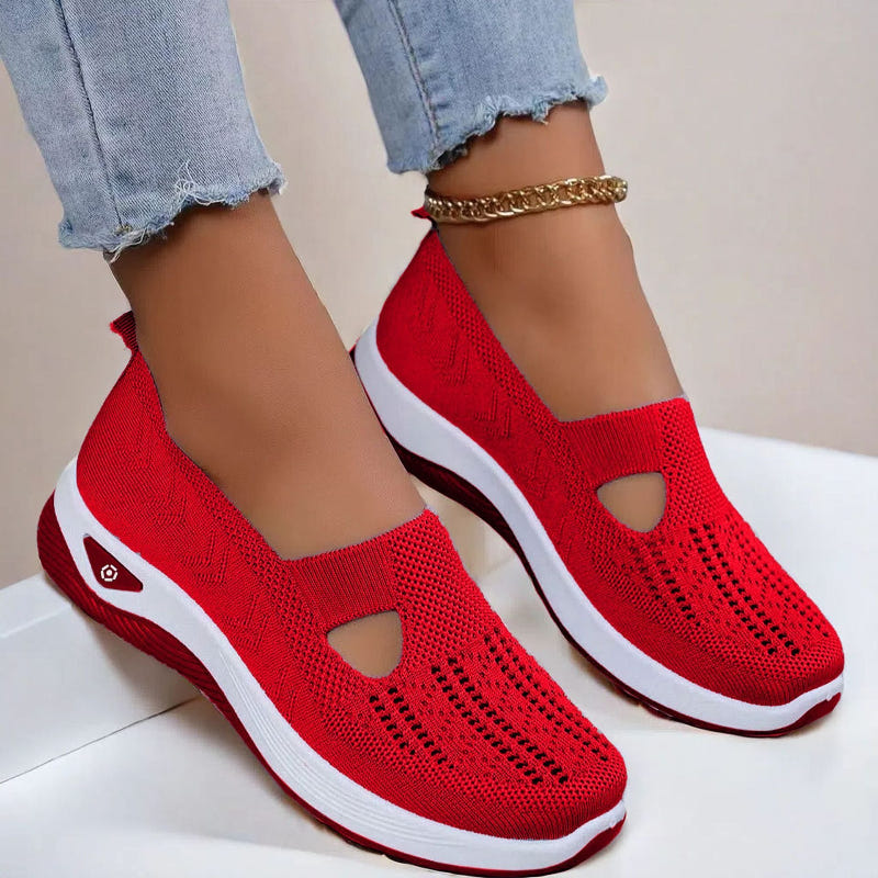 Women’s mesh flats in red, breathable slip-on with cutout toe and white sole